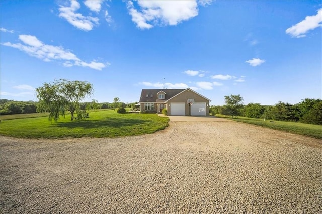 2640 Union Rd, Lawrence, KS 66044 - view of front facade featuring driveway, a front lawn, and an attached garage