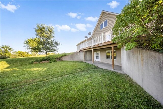2640 Union Rd, Lawrence, KS 66044 - view of grassy yard with a patio and a deck