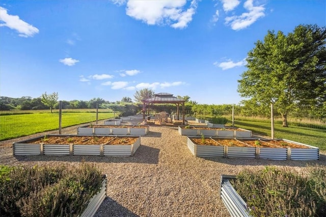 2640 Union Rd, Lawrence, KS 66044 - view of community with a gazebo, a garden, and a yard