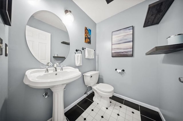 2640 Union Rd, Lawrence, KS 66044 - half bath featuring toilet and tile patterned floors