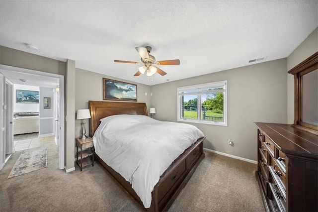 2640 Union Rd, Lawrence, KS 66044 - bedroom with light colored carpet and a ceiling fan