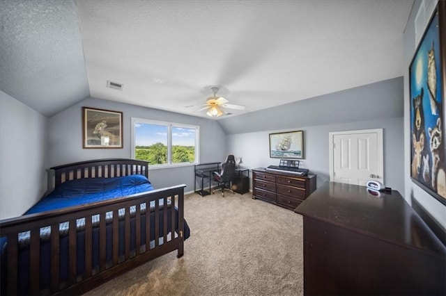 2640 Union Rd, Lawrence, KS 66044 - carpeted bedroom with lofted ceiling, an office area, and a ceiling fan