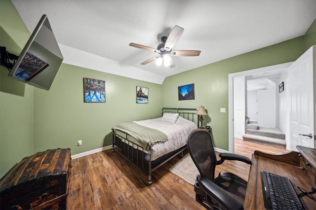 2640 Union Rd, Lawrence, KS 66044 - bedroom with wood finished floors, a desk, and a ceiling fan