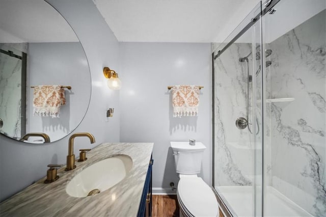 2640 Union Rd, Lawrence, KS 66044 - full bathroom featuring vanity, a marble finish shower, and wood finished floors
