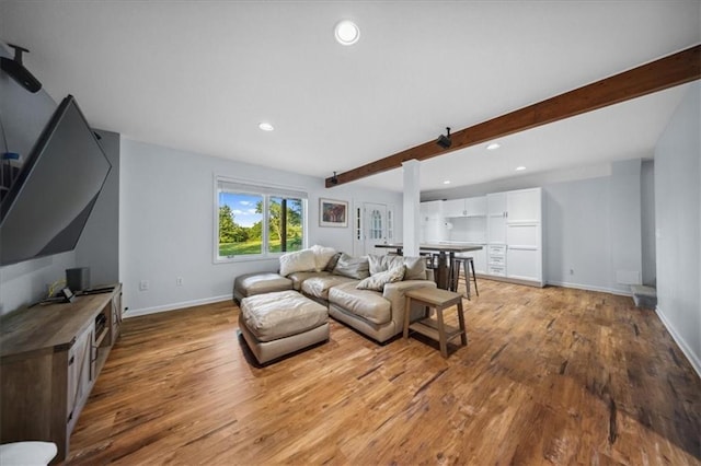 2640 Union Rd, Lawrence, KS 66044 - living room with beamed ceiling, light wood-style flooring, and recessed lighting