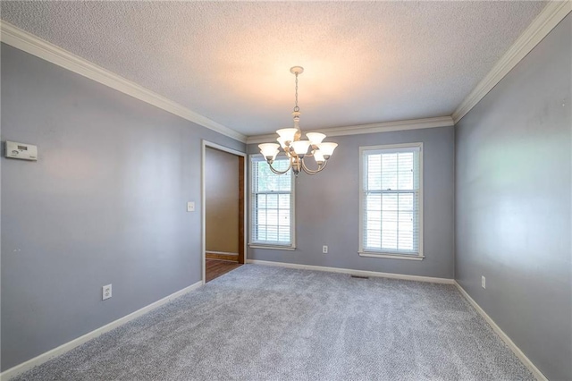 324 N Persimmon Dr, Olathe, KS 66061 - carpeted spare room featuring a textured ceiling, a chandelier, and ornamental molding