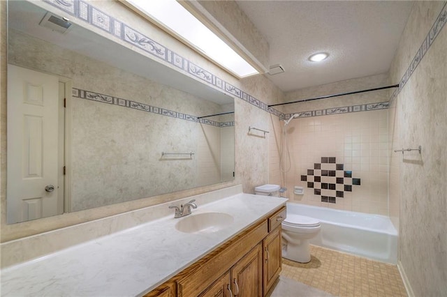 324 N Persimmon Dr, Olathe, KS 66061 - bathroom featuring vanity, tub / shower combination, and a textured ceiling
