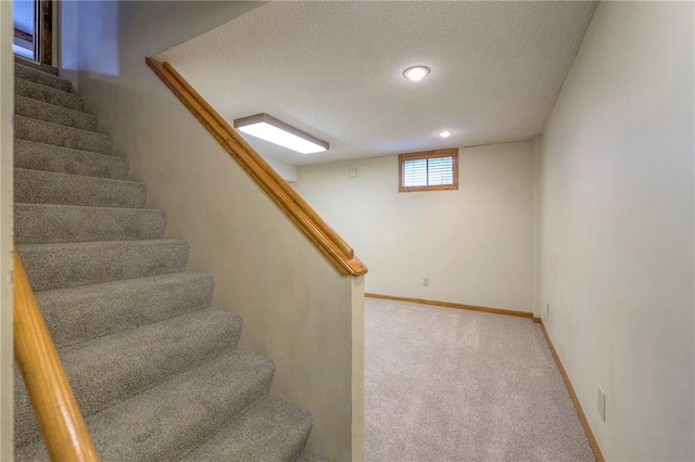 324 N Persimmon Dr, Olathe, KS 66061 - stairs featuring a textured ceiling, carpet floors, and recessed lighting