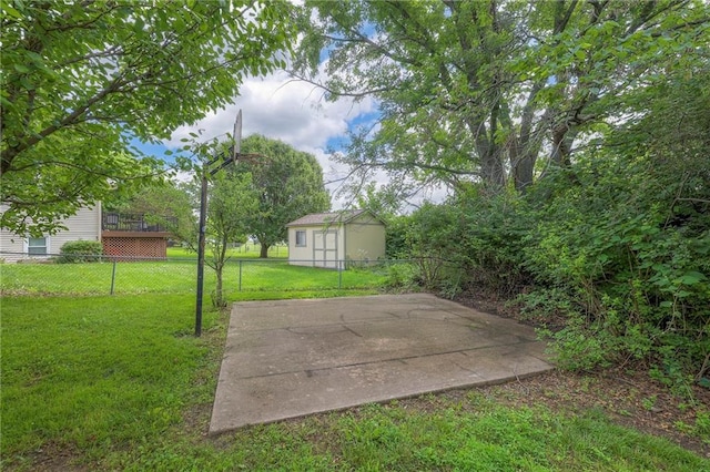 324 N Persimmon Dr, Olathe, KS 66061 - fenced backyard with a storage shed and a patio