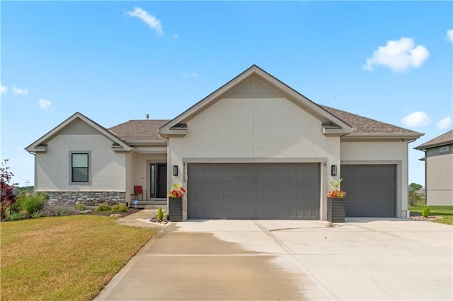 21115 W 186th Ter, Spring Hill, KS 66083 - view of front facade featuring stucco siding, an attached garage, a front yard, driveway, and stone siding