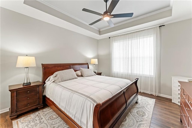 21115 W 186th Ter, Spring Hill, KS 66083 - bedroom featuring a raised ceiling, wood finished floors, ornamental molding, and baseboards
