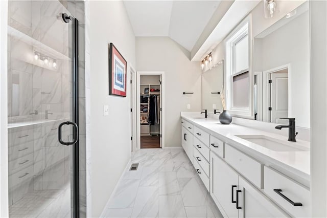 21115 W 186th Ter, Spring Hill, KS 66083 - full bathroom with double vanity, marble finish floors, baseboards, a shower stall, and lofted ceiling