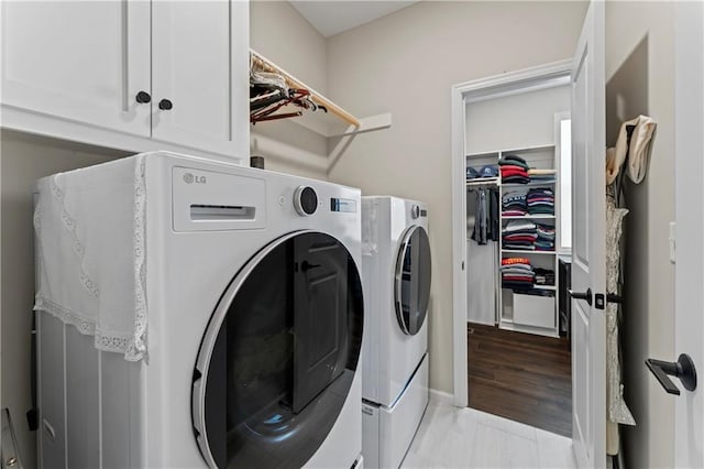21115 W 186th Ter, Spring Hill, KS 66083 - washroom with separate washer and dryer, cabinet space, and baseboards
