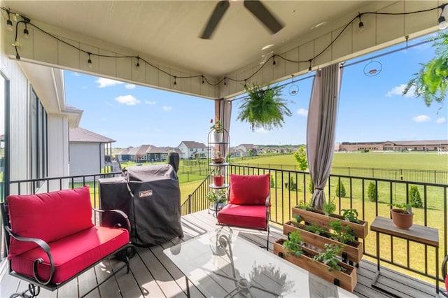21115 W 186th Ter, Spring Hill, KS 66083 - wooden deck with a lawn, a residential view, and a ceiling fan