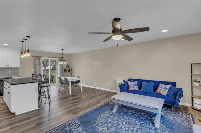 2604 S 16th Ter, Leavenworth, KS 66048 - living room featuring wood finished floors, a ceiling fan, baseboards, and recessed lighting