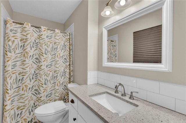 2604 S 16th Ter, Leavenworth, KS 66048 - full bath with vanity, toilet, and a shower with curtain