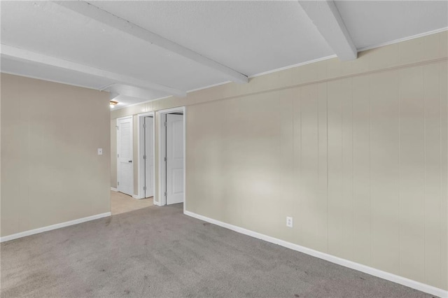 2604 S 16th Ter, Leavenworth, KS 66048 - empty room featuring beamed ceiling and carpet floors