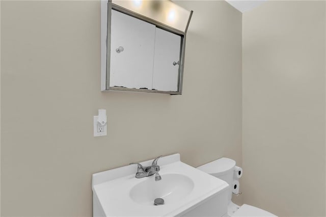 2604 S 16th Ter, Leavenworth, KS 66048 - half bath featuring toilet and vanity