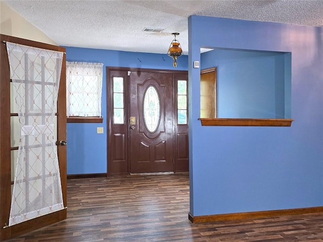 2101 Hillview Rd, Liberty, MO 64068 - entryway with wood finished floors and a textured ceiling