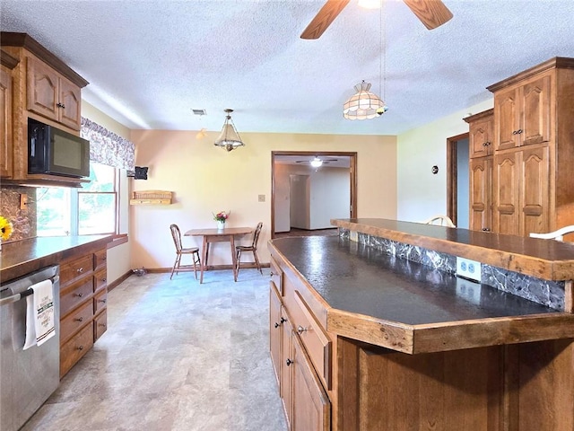 2101 Hillview Rd, Liberty, MO 64068 - kitchen featuring dishwasher, ceiling fan, black microwave, dark countertops, and a textured ceiling