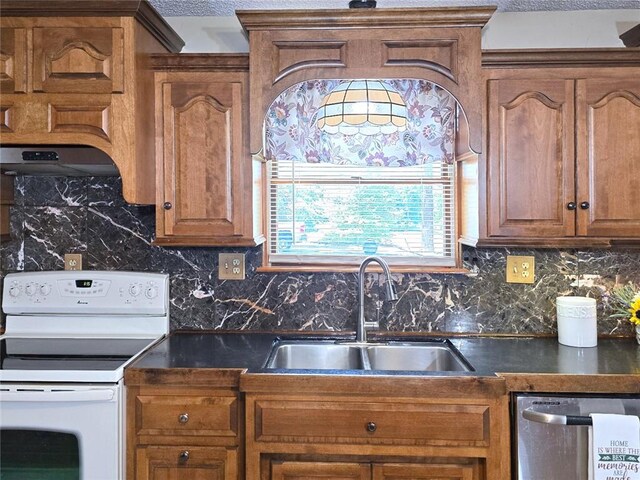 2101 Hillview Rd, Liberty, MO 64068 - kitchen featuring electric range, dishwasher, brown cabinets, and dark countertops