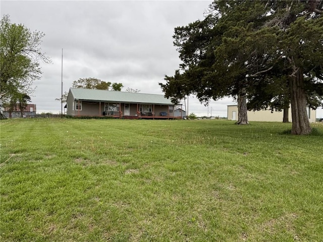32592 SE 500th Rd, Kincaid, KS 66039 - view of front of home with a front yard and a porch