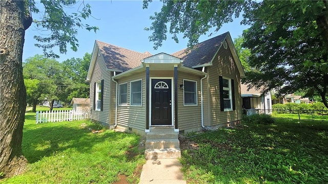 524 S Hill St, Fort Scott, KS 66701 - bungalow-style house featuring roof with shingles, entry steps, and crawl space