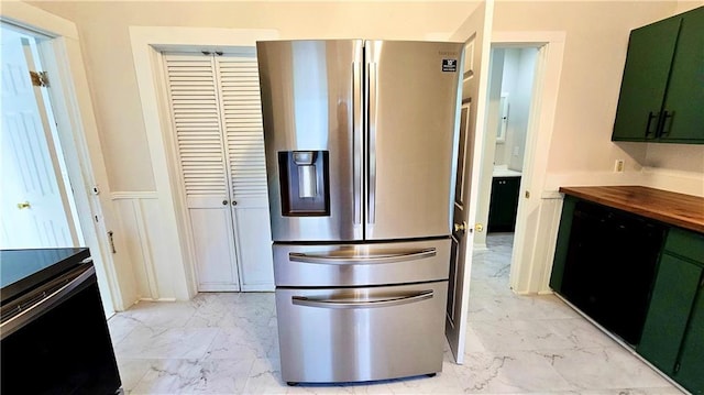 524 S Hill St, Fort Scott, KS 66701 - kitchen featuring stainless steel refrigerator with ice dispenser, green cabinetry, light marble finish flooring, and butcher block counters
