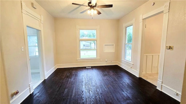 524 S Hill St, Fort Scott, KS 66701 - empty room with hardwood / wood-style floors, ceiling fan, and baseboards