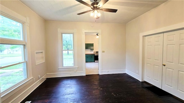 524 S Hill St, Fort Scott, KS 66701 - spare room with ceiling fan, hardwood / wood-style flooring, and healthy amount of natural light
