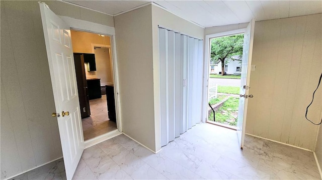 524 S Hill St, Fort Scott, KS 66701 - entryway featuring light marble finish floors and baseboards