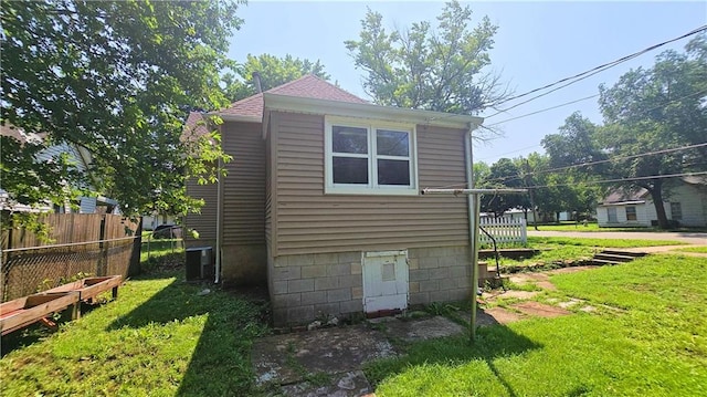 524 S Hill St, Fort Scott, KS 66701 - view of home's exterior with cooling unit