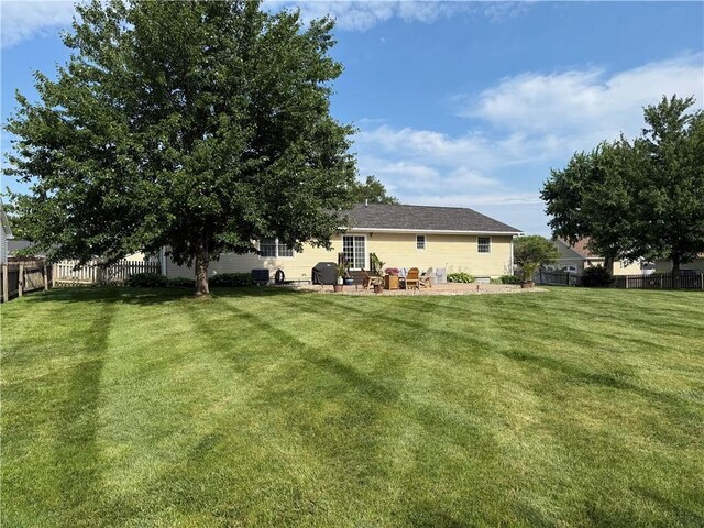 226 James Ave, Maryville, MO 64468 - back of house featuring a patio area
