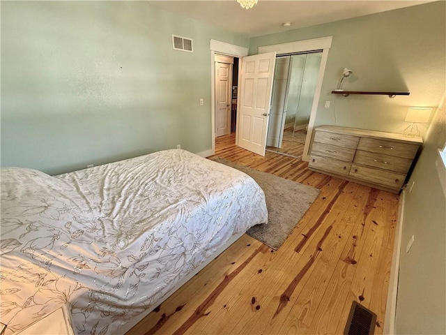 226 James Ave, Maryville, MO 64468 - bedroom featuring light wood-style flooring, a closet, and baseboards