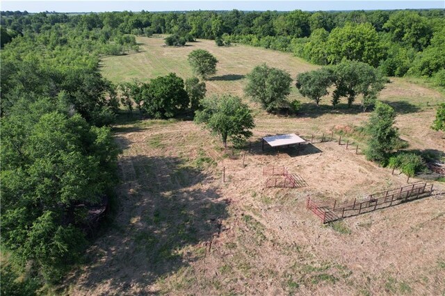 4004 Texaco Rd, Cushing, OK 74023 - aerial view of property and surrounding area with rural landscape and a forest