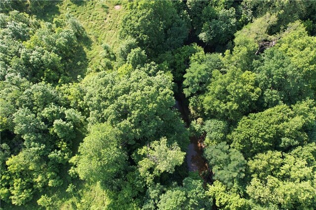 4004 Texaco Rd, Cushing, OK 74023 - view of property location with a heavily wooded area