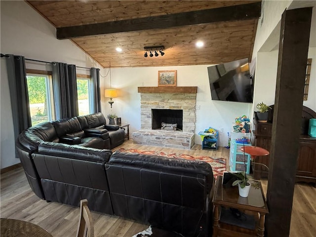 4004 Texaco Rd, Cushing, OK 74023 - living area featuring wooden ceiling, wood finished floors, and a fireplace
