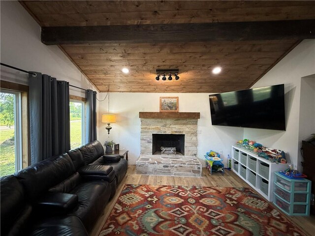 4004 Texaco Rd, Cushing, OK 74023 - living area featuring wooden ceiling, wood finished floors, a stone fireplace, lofted ceiling, and recessed lighting
