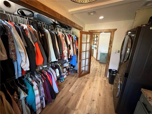 4004 Texaco Rd, Cushing, OK 74023 - spacious closet with french doors and light wood finished floors
