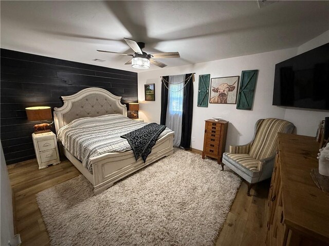 4004 Texaco Rd, Cushing, OK 74023 - bedroom featuring wood finished floors and ceiling fan