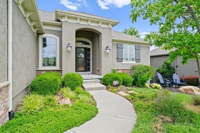 17208 W 198th St, Spring Hill, KS 66083 - view of exterior entry with stucco siding