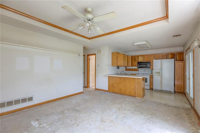 1609 N Lazy Branch Rd, Independence, MO 64058 - kitchen with white appliances, a sink, a peninsula, light countertops, and concrete floors