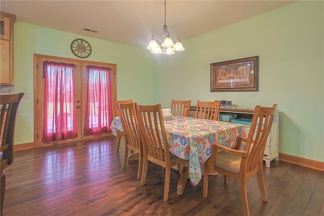 5260 SE Fox Run Rd, Lathrop, MO 64465 - dining space featuring a chandelier, wood-type flooring, baseboards, and french doors