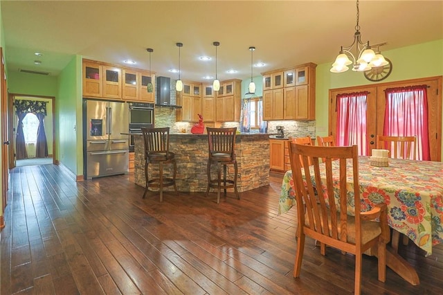 5260 SE Fox Run Rd, Lathrop, MO 64465 - dining space featuring a chandelier, dark wood finished floors, recessed lighting, and french doors