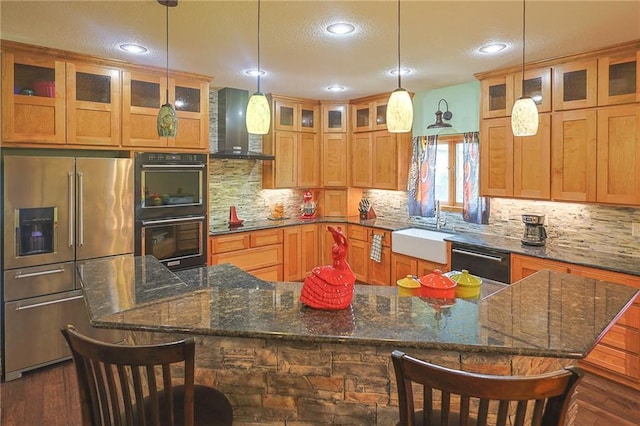 5260 SE Fox Run Rd, Lathrop, MO 64465 - kitchen featuring wall chimney range hood, high quality fridge, dishwashing machine, a sink, and a spacious island
