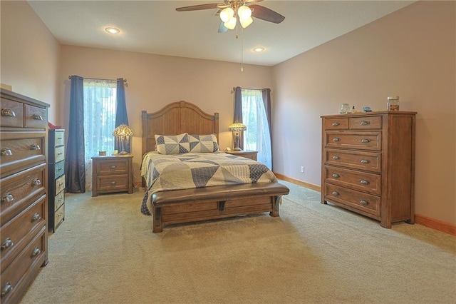 5260 SE Fox Run Rd, Lathrop, MO 64465 - bedroom featuring multiple windows, light colored carpet, baseboards, and recessed lighting