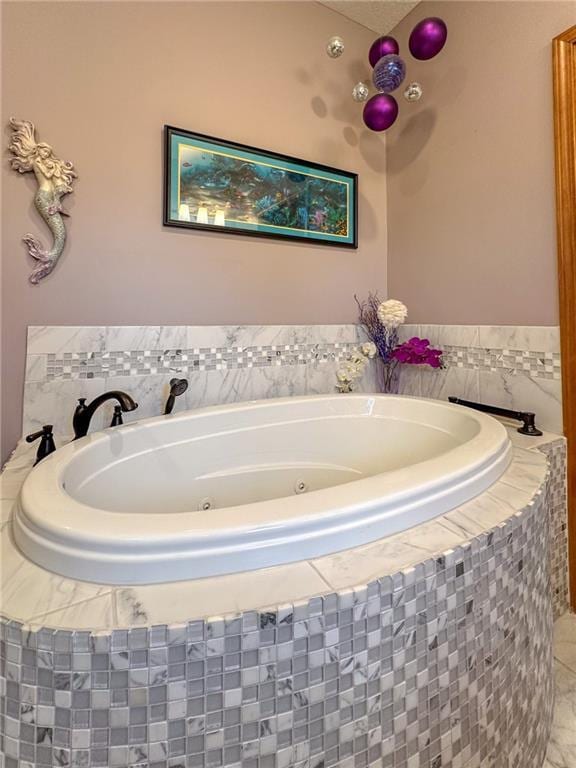 5260 SE Fox Run Rd, Lathrop, MO 64465 - bathroom featuring a whirlpool tub and tile patterned flooring
