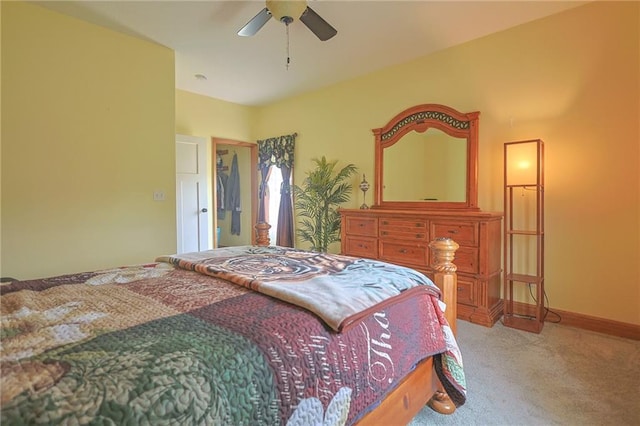 5260 SE Fox Run Rd, Lathrop, MO 64465 - bedroom with carpet floors, ceiling fan, and baseboards