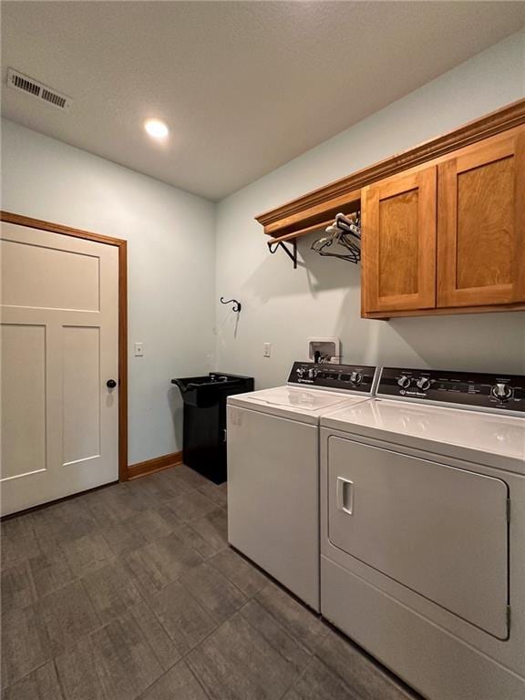 5260 SE Fox Run Rd, Lathrop, MO 64465 - washroom with cabinet space, separate washer and dryer, recessed lighting, and baseboards