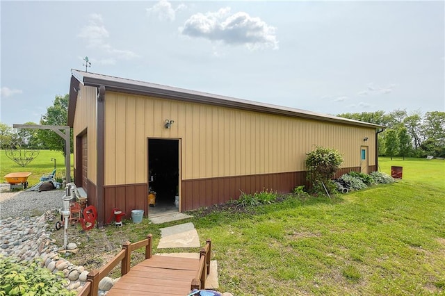 5260 SE Fox Run Rd, Lathrop, MO 64465 - view of pole building with a lawn